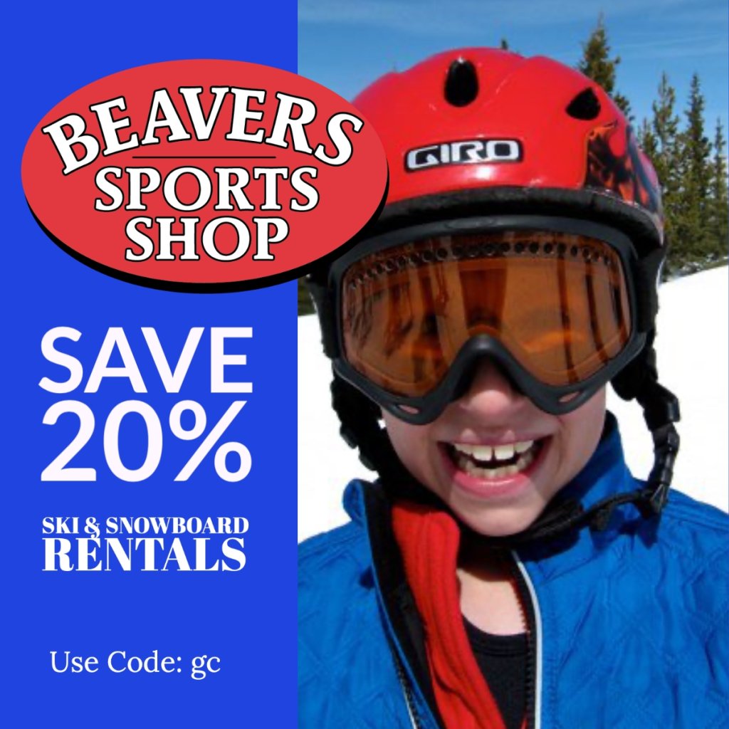 A smiling child wearing a red ski helmet and goggles, advertising ski rental discounts in Grand County Colorado.